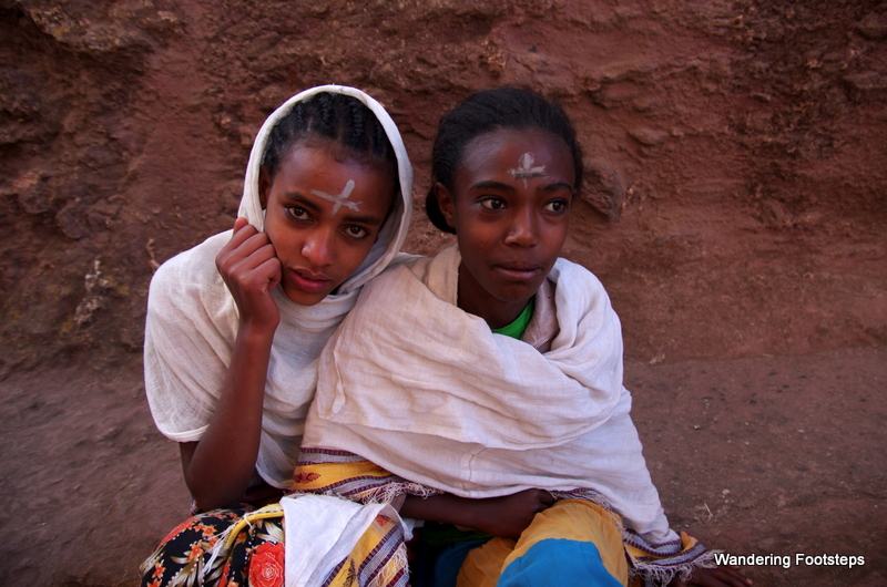 I didn't capture the cross tattoes, but I did snap a photo of these young girls coming back from Sunday mass in Lalibela.