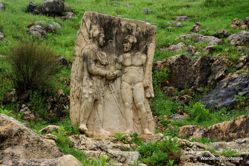 An Ancient Greek stone relief portraying Mithridates I shaking hands with naked Heracles.  Inside Nemrut Dağı National Park.
