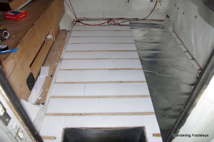 Layer upon layer of floor insulation.