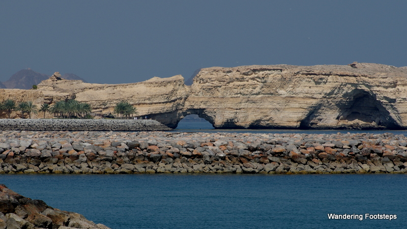 Hole in a rocky outcrop along Oman's stunning eastern coastline.
