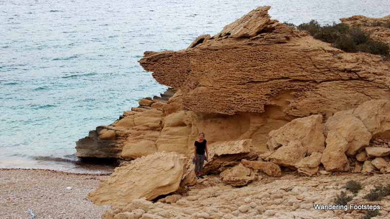 Exploring a rocky beach along Oman’s coast.