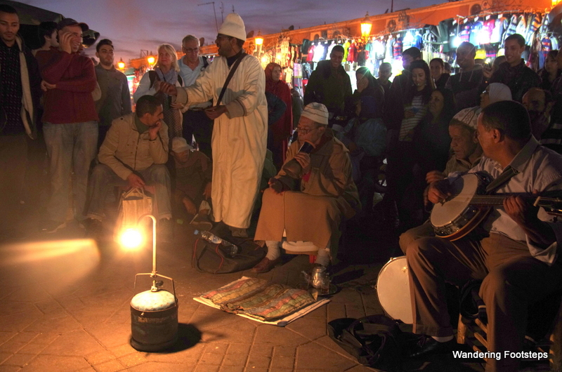 By the light of an oil lamp on the Djemaa el Fna, buskers have weaved their stories and songs for almost a thousand years.  Well, maybe they didn't always have oil lamps...