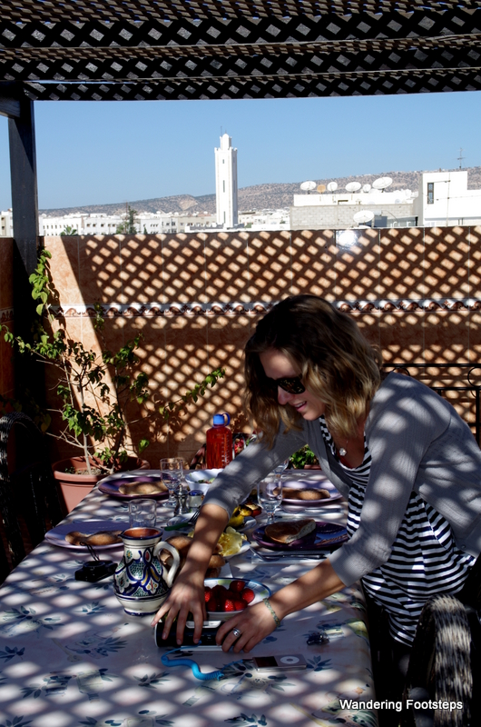 Me prepping our rooftop terrace lunchtime picnic.