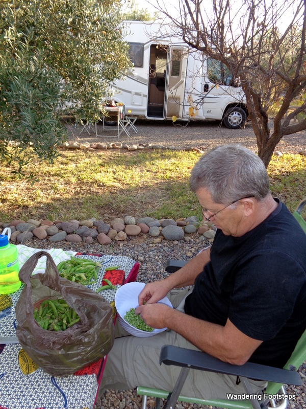 Meanwhile, dad is “staying out of her hair” by helping me prep dinner outside.