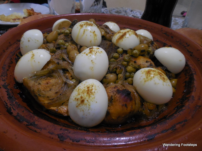 Chicken tagine with boiled eggs, olives, and preserved lemon.