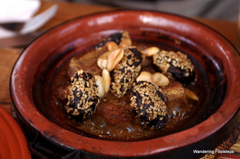 Dried fruit finding its way into a tagine.