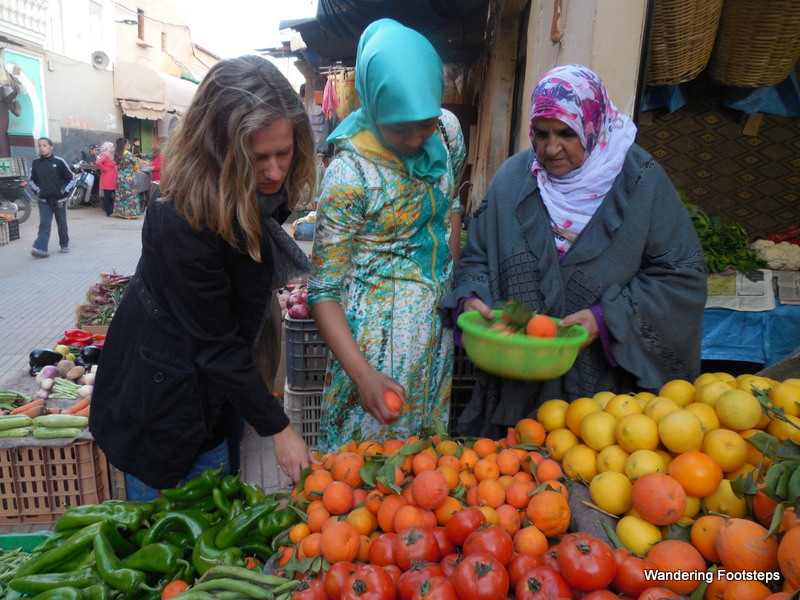 Produce shopping in Taroundant's medina with Atika and Hafida's mom.