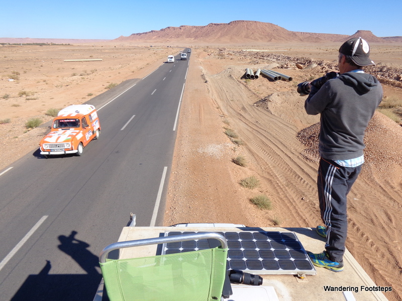 Bruno on the roof photographing the 4L Trophy rally.