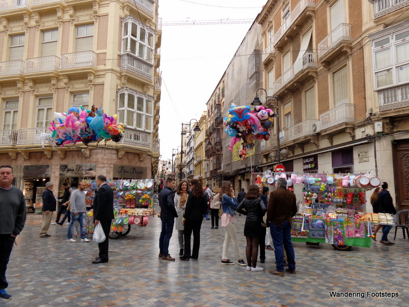 Balloons, carnival rides, and plastic toys for sale in the historical part of Cartagena.