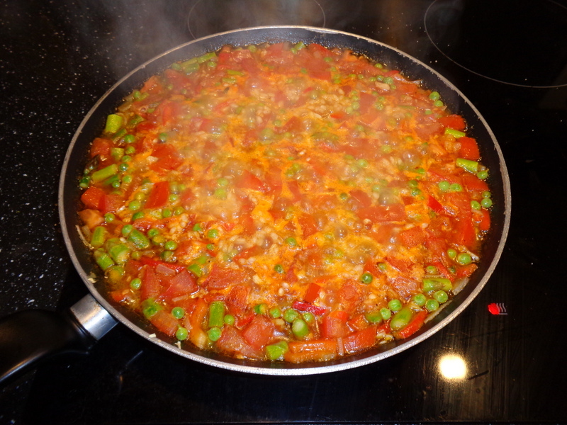 My own vegan paella simmering on the stovetop.  It was just as delicious as the seafood-infused paella!