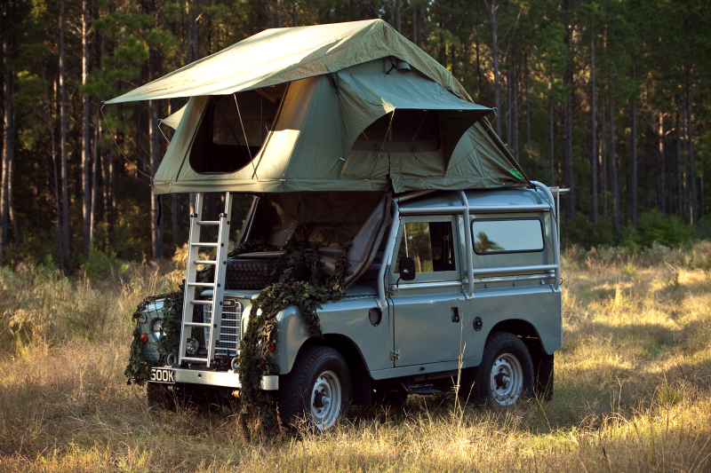 A Land Rover with a rooftop tent (what you see a lot of in Africa).