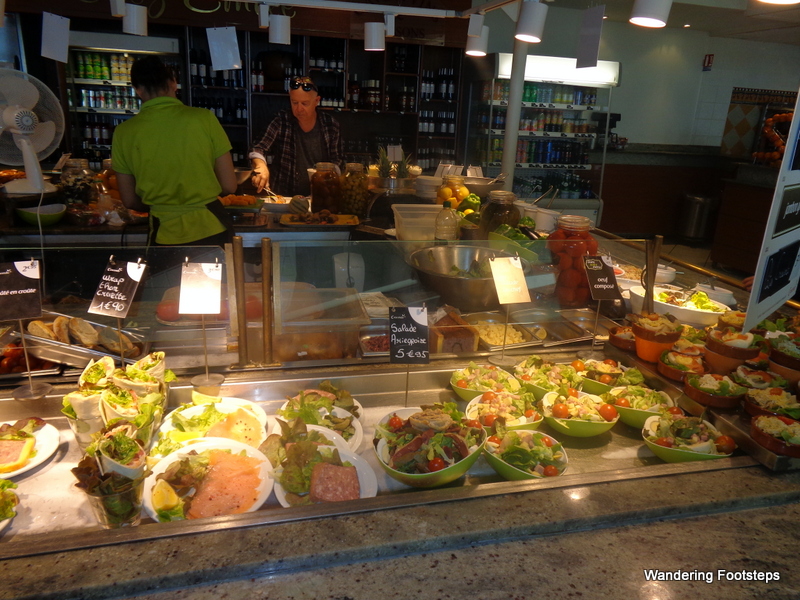 The salad/cheese/dessert bar at French cafeterias.