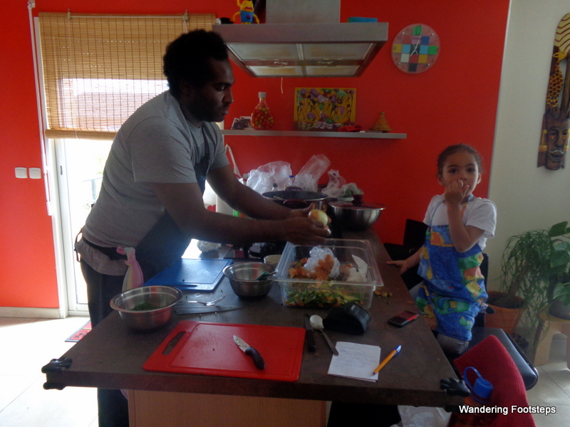 Learning to cook food from Guadeloupe with Dimitri (and his daughter!).