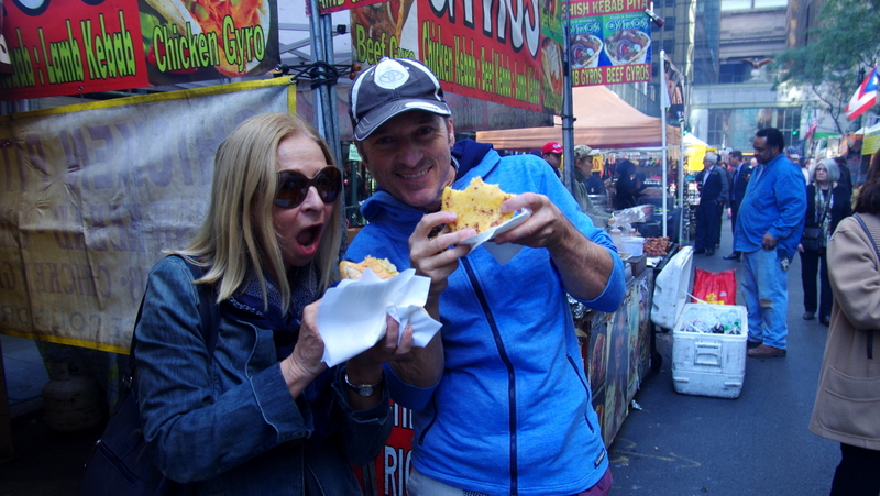 Louise and Bruno chowing down on street food.
