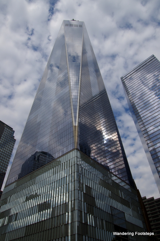 The new One World Trade Center Tower reflecting the clouds, that's how tall it is!