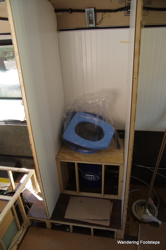 The beginnings of our composting toilet - a box, a seat, and a bucket.