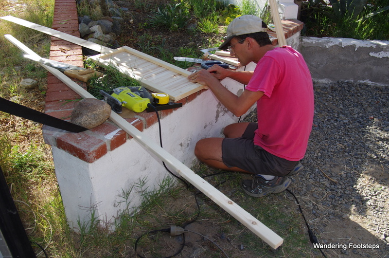 Our HelpX volunteer, AJ, working on his carpentry projects.