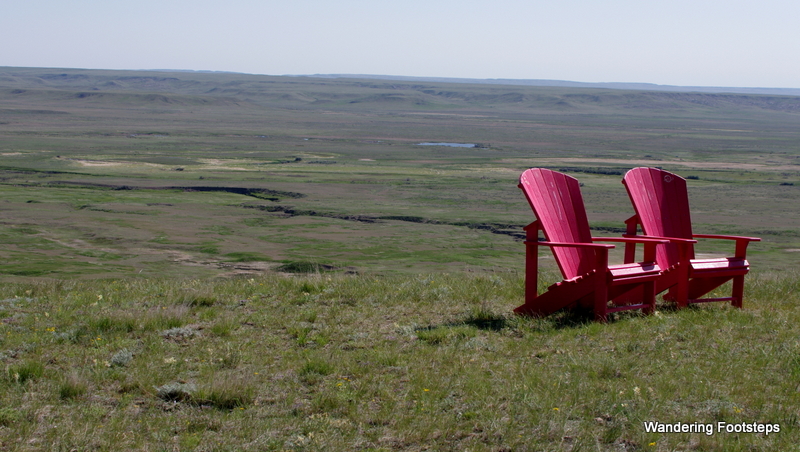 Spotting the red adirondack chairs for the first time, at the very beginning of our road trip, in Saskatchewan's Grasslands National Park.