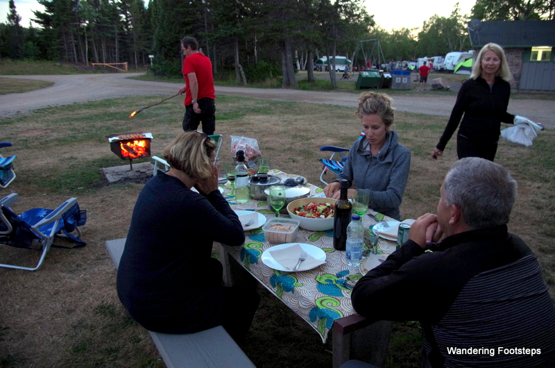 A quintessential camping experience: a barbecue/bonfire!