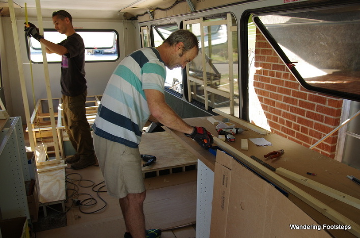 Bruno and a HelpX volunteer building our new home-on-wheels.