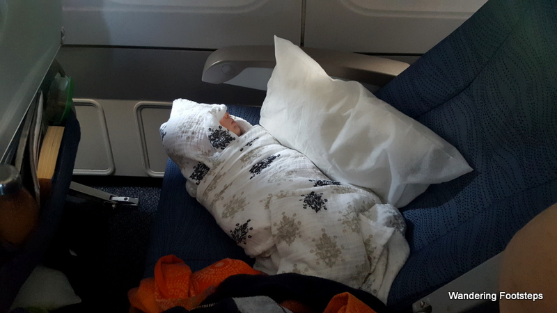 Near the end of the flight I gave Phoenix my seat.  Too bad we didn't have the baby bassinet.