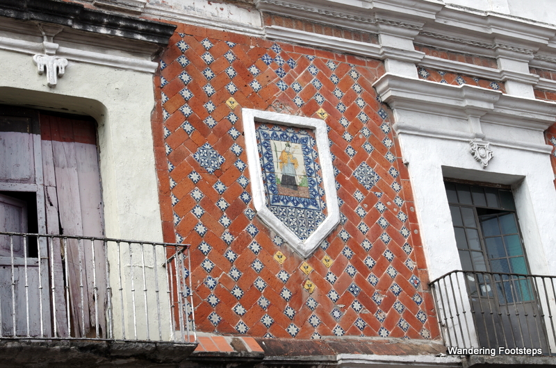 Close-up of the type of tiles along the facades of many buildings in Puebla.